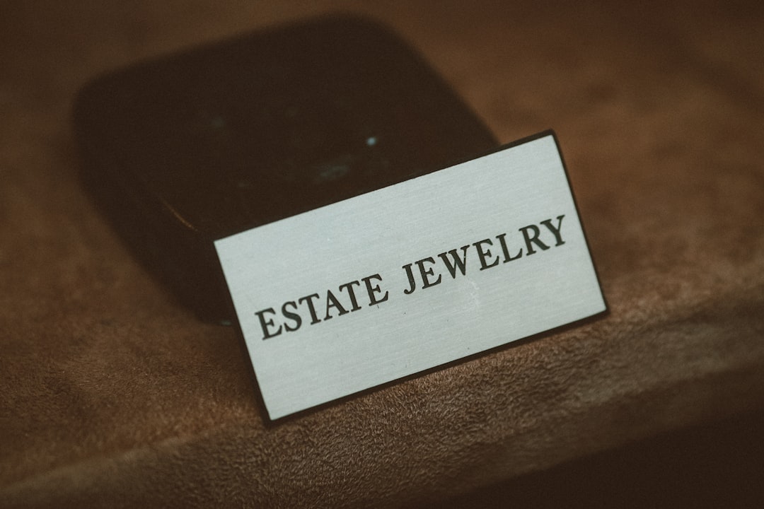 A modern smartphone resting on a rustic wooden table, illustrating the blend of technology and natural materials, ideal for first-time home buyers exploring digital tools in the 2026 real estate market.